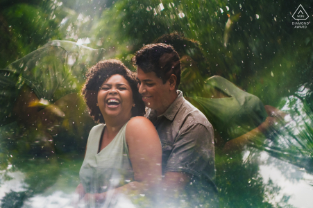 Pre-wedding engagement image-session in Maceió, Brazil showing that As the couple hugged, a gentle rain fell