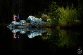 Mountain lake engagement image of the couple reflected in the lake in Frisco, CO