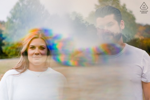 An artistic and creative lifestyle portrait of a couple in a park in Kansas City, Missouri, using a prism effect